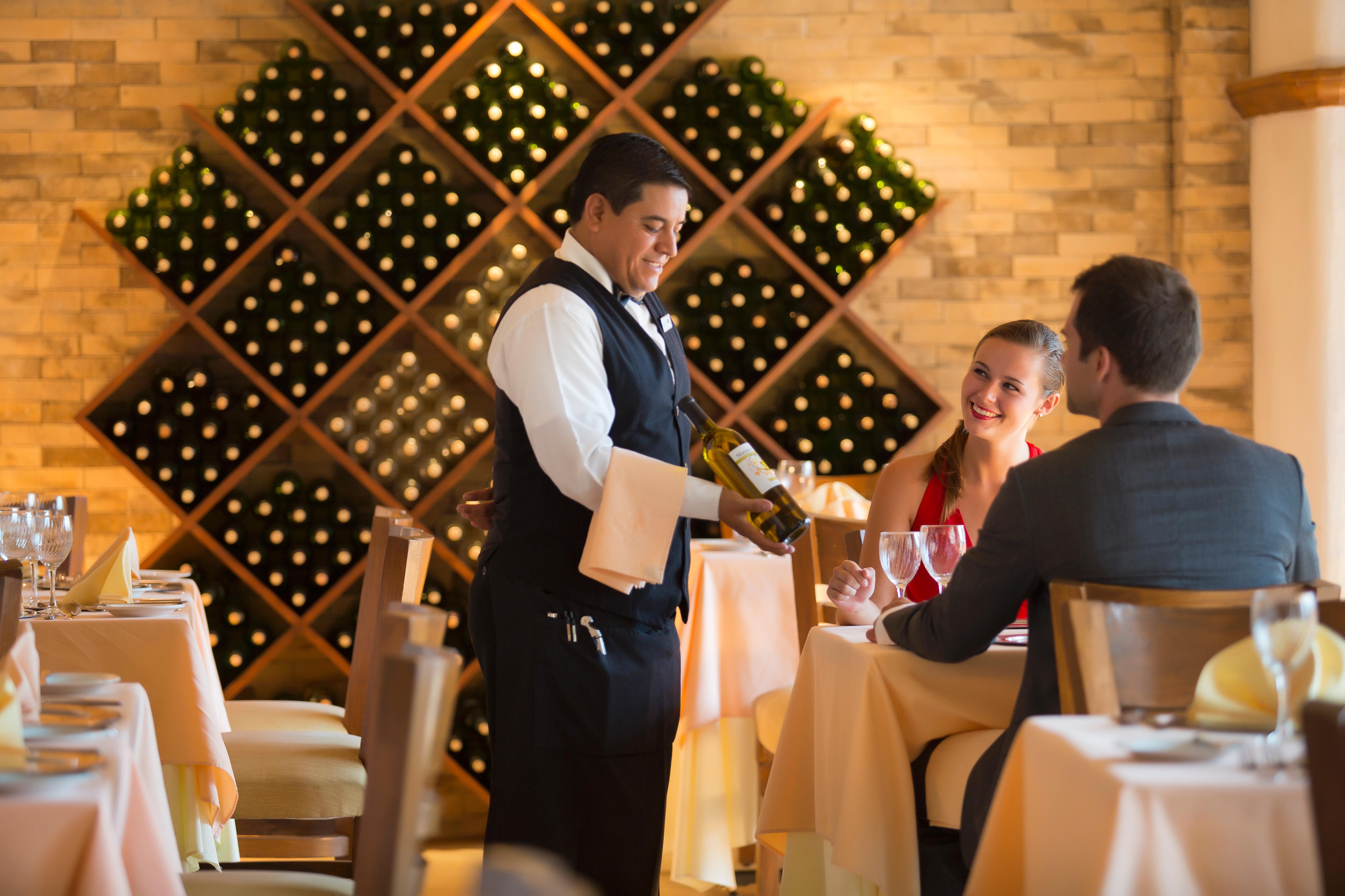 Crown Paradise Golden All Inclusive Resort - Adults Only Puerto Vallarta Exterior foto A sommelier serving wine